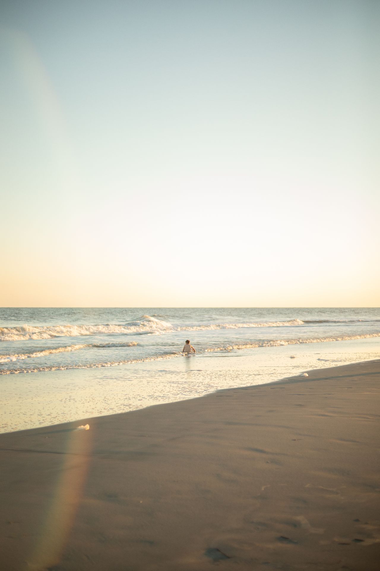 Surfer riding a wave near Charleston